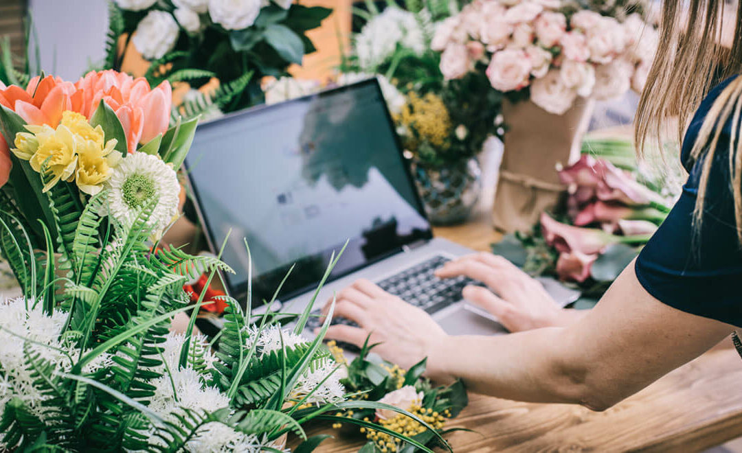 florist using interface of online flower shop