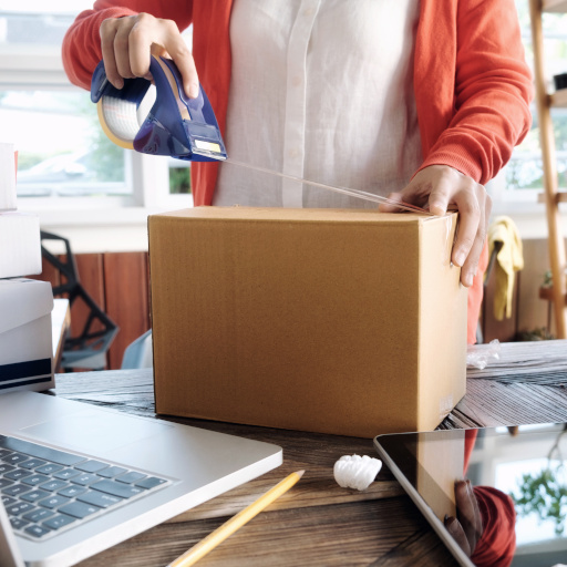 Young startup entrepreneur small business owner working at home, packaging and delivery situation.